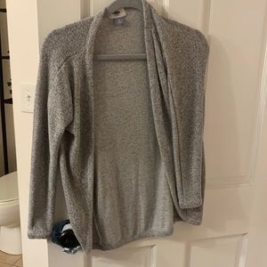 Slightly worn grey sweater